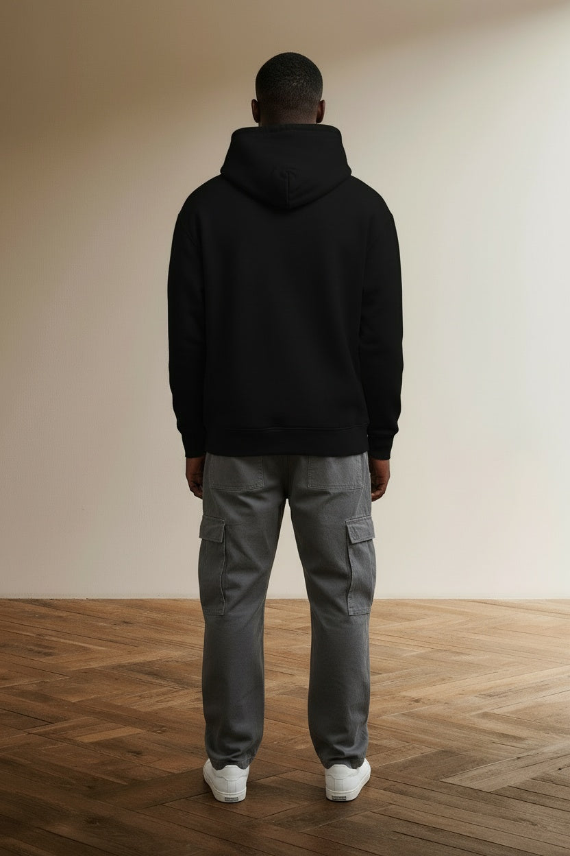 Back pose of the model wearing GOD IS MY STRENGTH, (MIND AND HEART) HOODIE